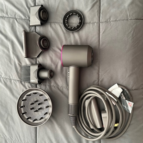 Dyson supersonic hair styler with attachments in fuschia...
